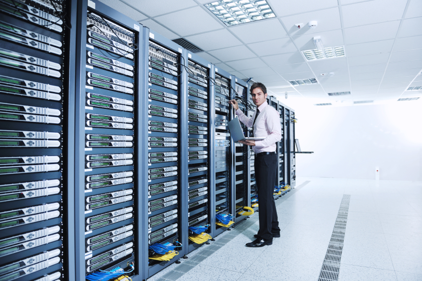 Businessman With Laptop In Network Server Room Domain Web Images, Photos, Reviews